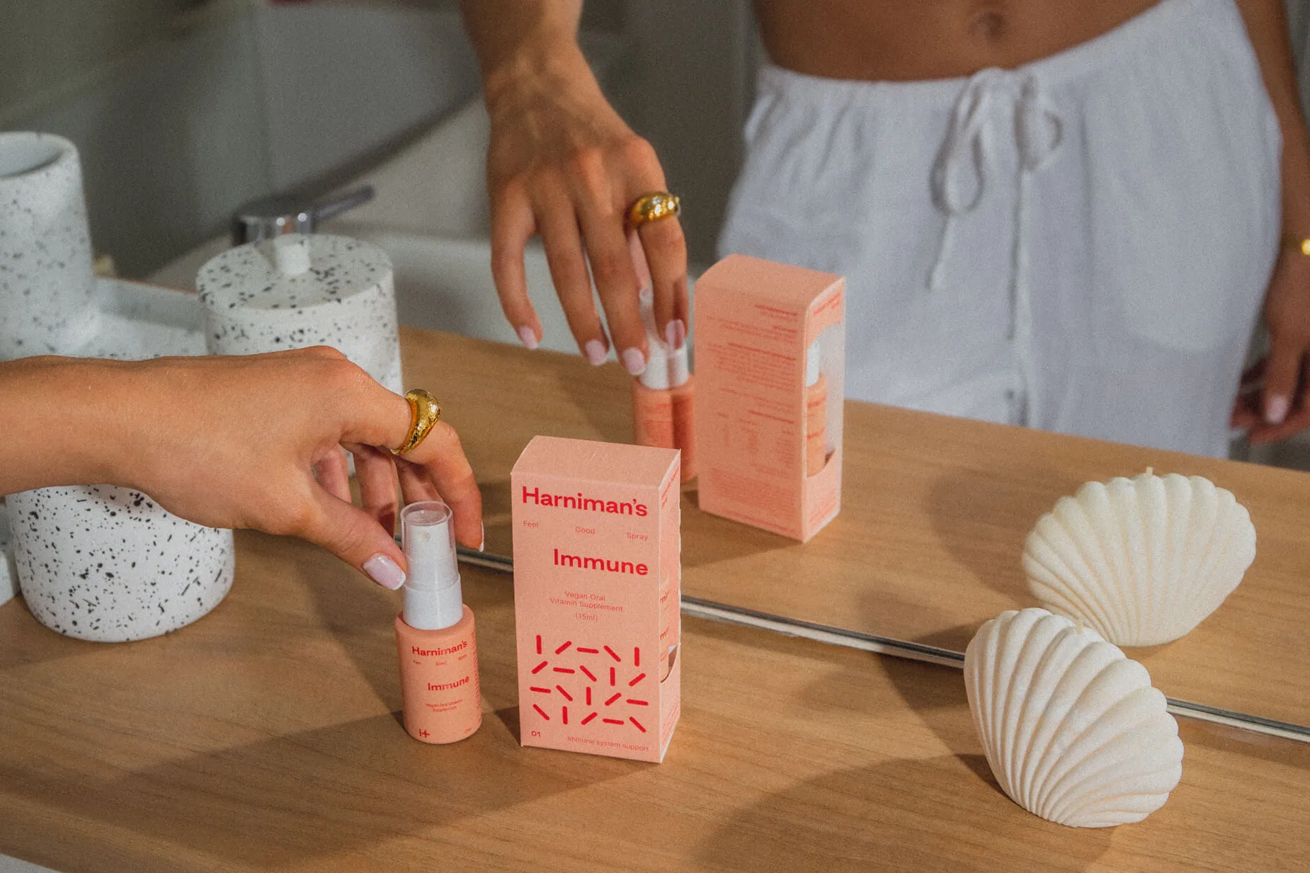 Harniman's Immune Vitamin spray on a bathroom counter